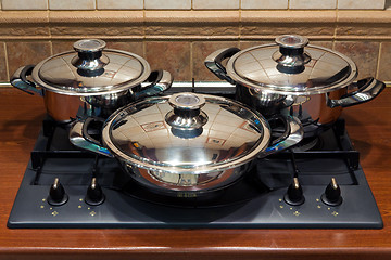 Image showing Set the pan on the stove