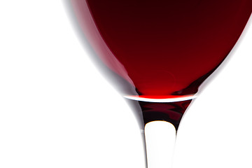 Image showing A glass of red wine on white. Detail