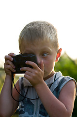 Image showing The child photographs.