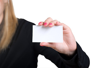 Image showing The girl holds a card in hands