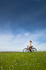 Image showing Riding a bicycle