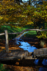 Image showing Wooden bridge and stream