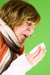 Image showing portrait of a cold girl sneezes 