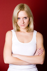 Image showing blond woman on red