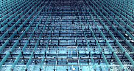 Image showing symmetrical glass sunshade on office building