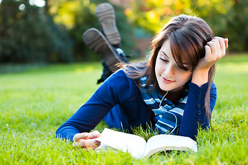 Image showing Mixed race college student studying