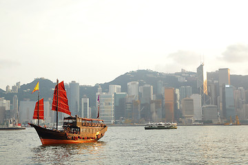 Image showing Hong Kong harbor with red sail boat