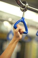 Image showing hold the handrail