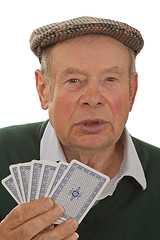 Image showing Senior with playing cards