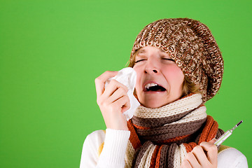 Image showing cold girl sneezes