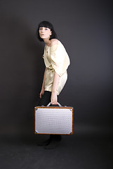 Image showing A girl with suitcase  