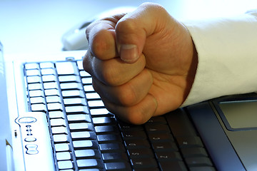 Image showing Fist on laptop