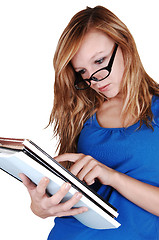 Image showing Girl reading books.