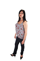 Image showing Standing girl in jeans.