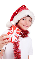 Image showing Cute christmas boy with a red gift