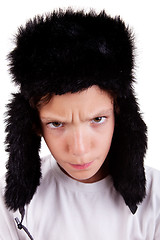 Image showing cute boy with a cap, angry
