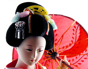 Image showing  Geisha doll with umbrella portrait