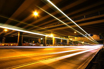 Image showing Megacity Highway at night with light trails 