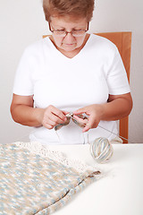 Image showing Elderly woman knitting