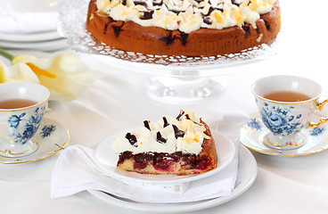 Image showing Cherry sponge cake with cream