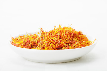 Image showing Saffron leaves spice in white dish