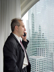 Image showing Businessman  by the window