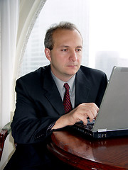 Image showing Businessman with laptop