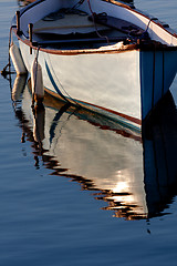 Image showing Morning light on a grey boat 