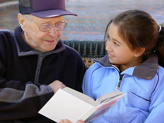 Image showing Grandfather reading