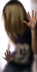 Image showing Girl behind the glass    