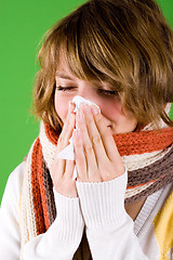 Image showing cold girl sneezes