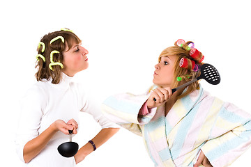 Image showing two funny housewifes with  kitchen utensil 