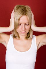 Image showing woman covering her ears 