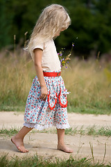 Image showing girl with flowers