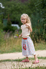 Image showing girl with flowers