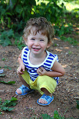 Image showing smiling baby in summer garden