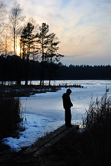 Image showing Sunset on the lake in March