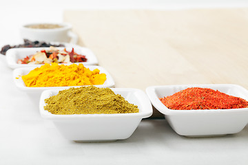 Image showing Spices at wooden board