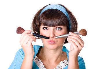 Image showing woman with two make-up brushes 