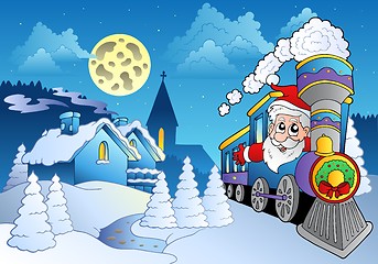 Image showing Santa on train near small village