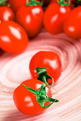 Image showing tomatoes on wooden table