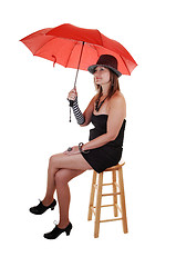Image showing Lady with hat and umbrella.