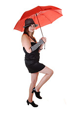 Image showing Lady with hat and umbrella.