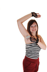 Image showing Girl putting deodorant on.