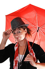 Image showing Lady with hat and umbrella.