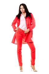 Image showing Beautiful young brunette in red suit