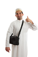 Image showing Ethnic man thumbs up approval