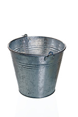 Image showing The empty zinced bucket a close up is isolated on white 