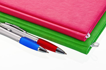 Image showing Pencil with a notebook. A close up