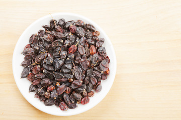 Image showing Barberries spice on wood